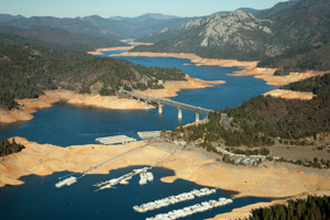 Aerial view of of I-5 Pit River Bridge over Lake Shasta showing low water level (drought conditions)