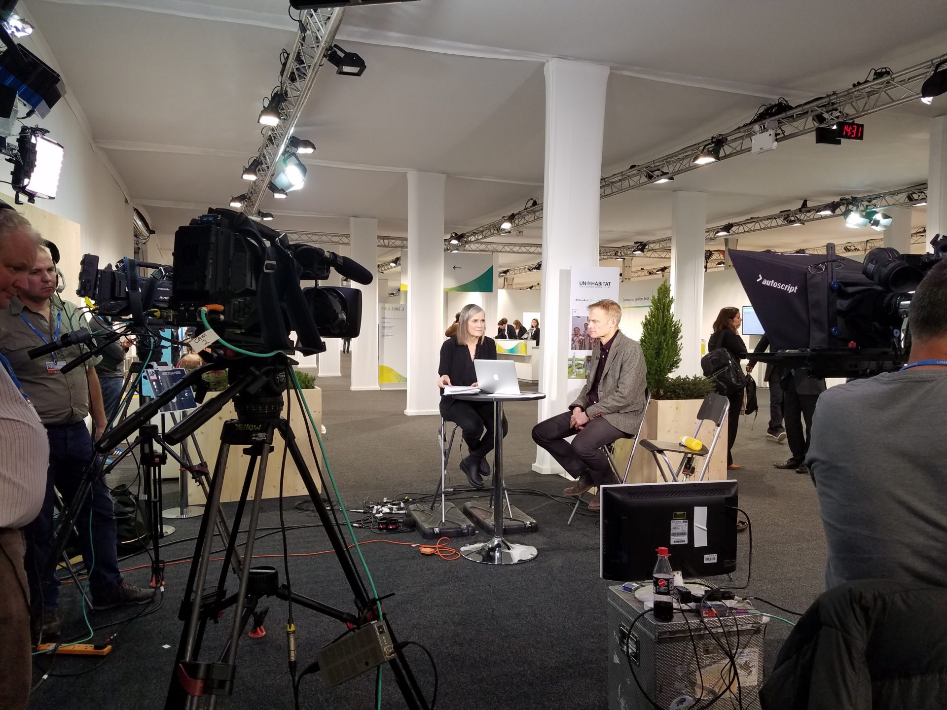 Amy Goodman of Democracy Now broadcasting from Bonn